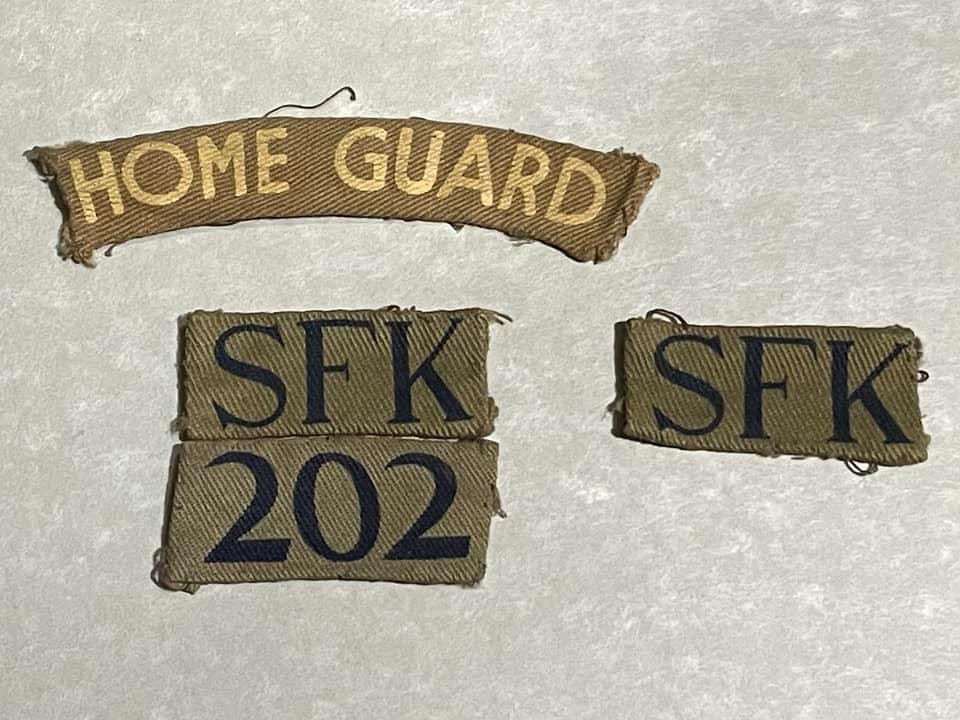 SFK (for Suffolk) 202 and Home Guard insignia issued to a member of Ipswich 1 Patrol 