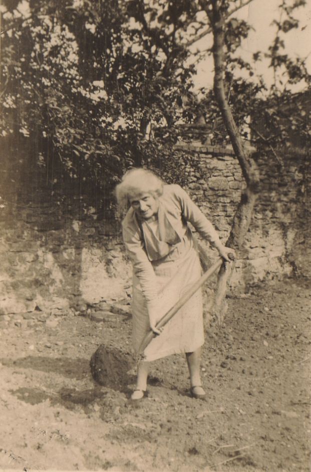 Mabel Stranks working in her garden