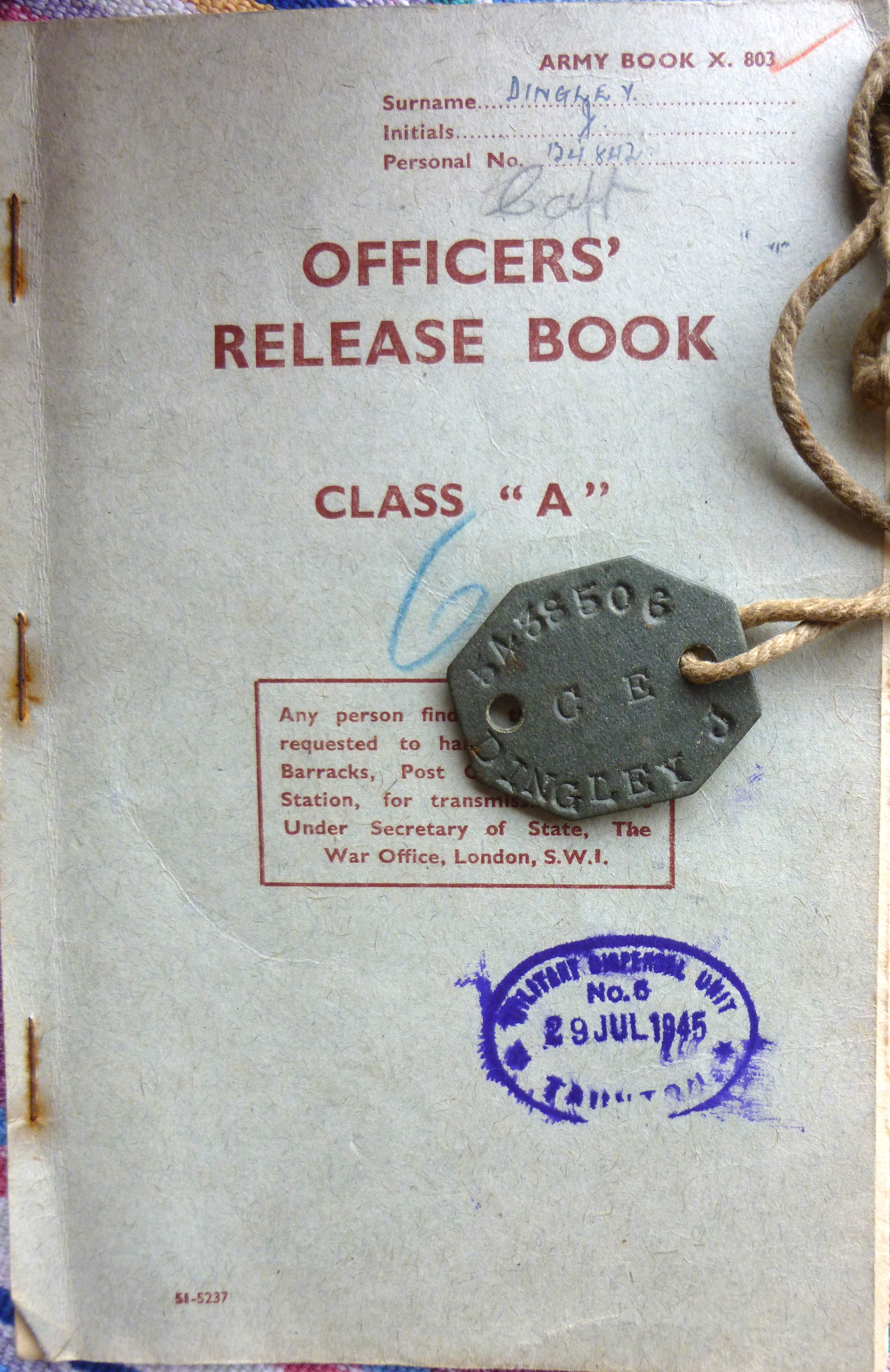 John Dingley officers book and dog tag